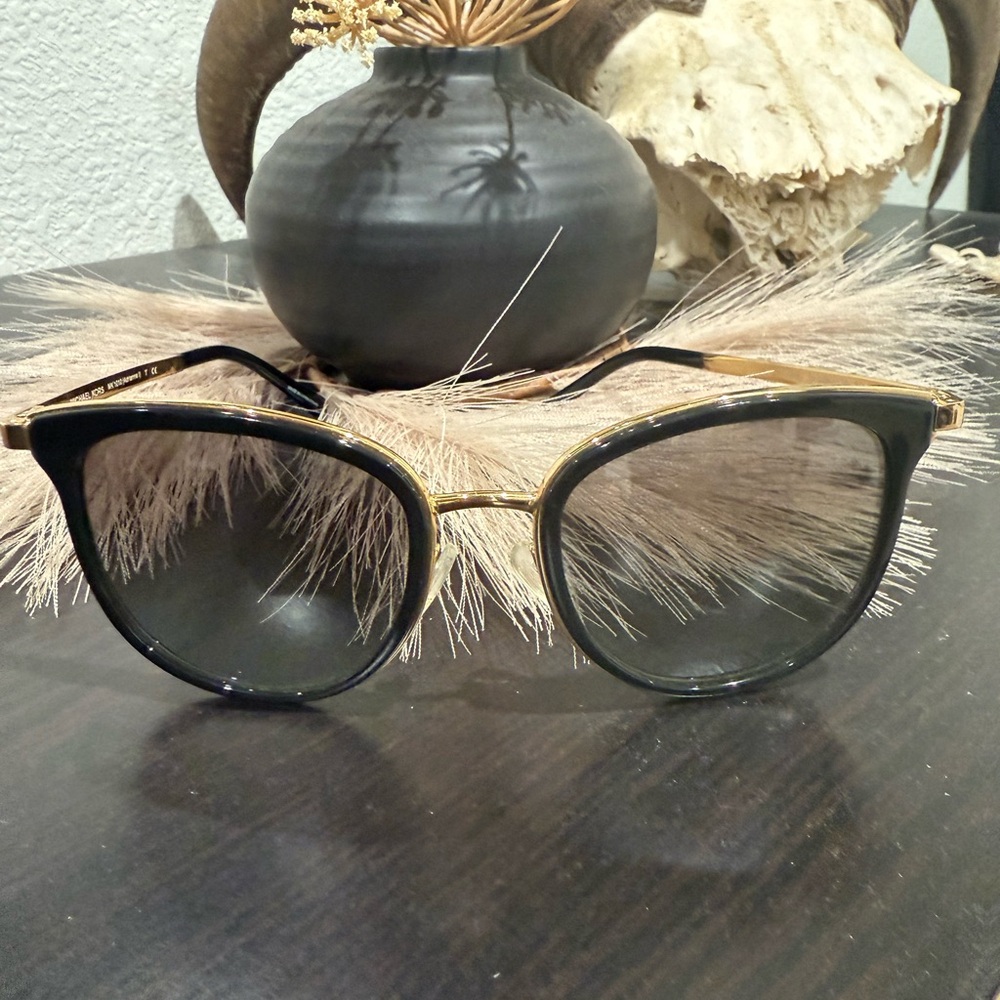 Sleek Black and Gold Cat-Eye Glasses with Metal Details